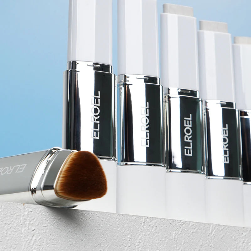 Row of ELROEL makeup products with a brush on a light blue background